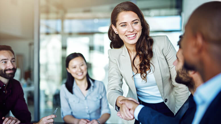 Corporate people shaking hands